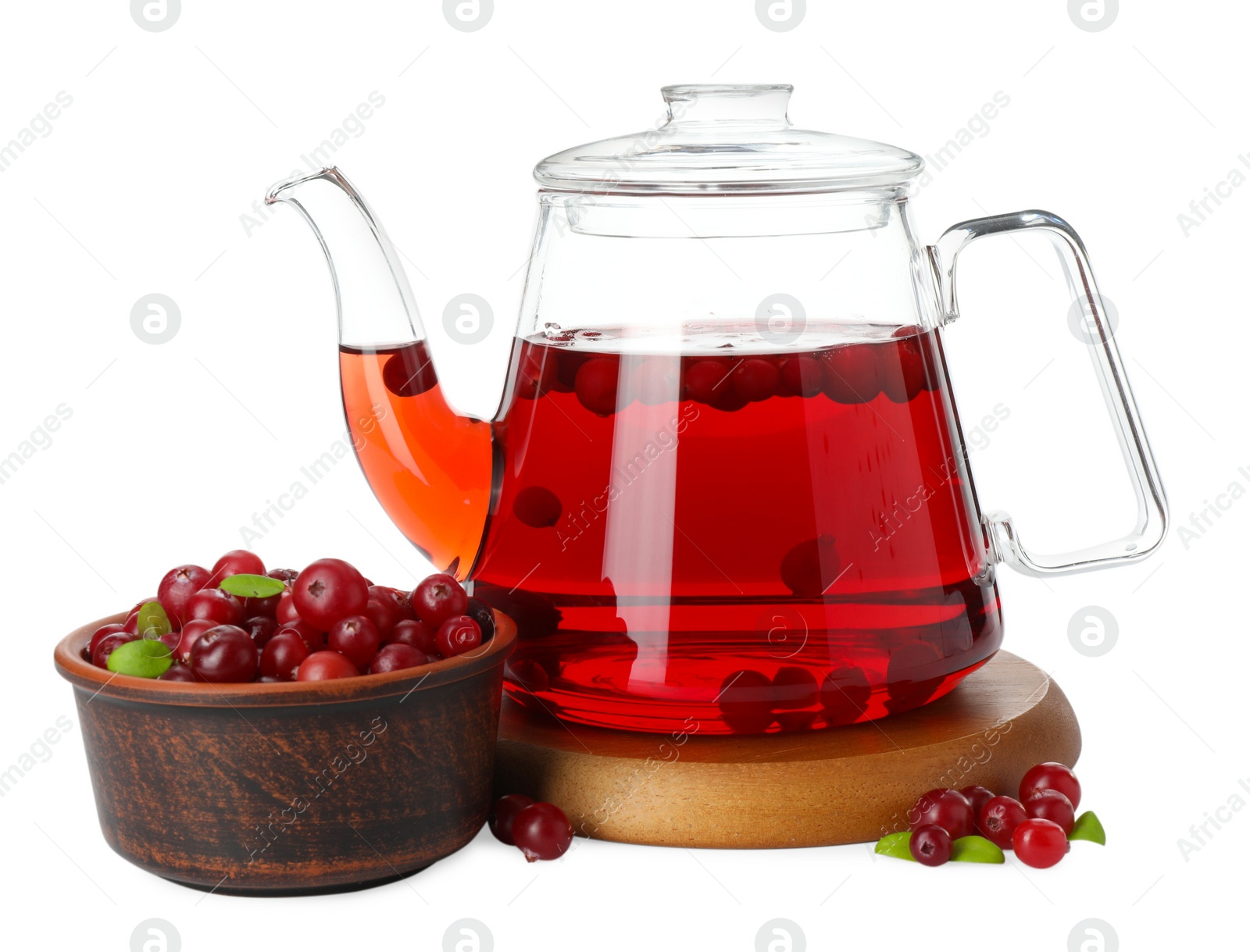 Photo of Delicious cranberry tea in teapot and berries isolated on white