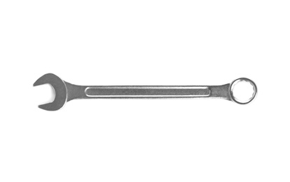 Photo of New wrench on white background, top view. Construction tools