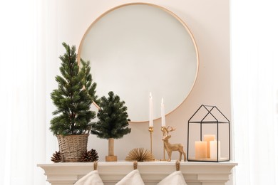 Photo of Different Christmas decorations in room. Interior design