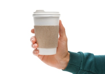 Man holding takeaway paper coffee cup with cardboard sleeve on white background