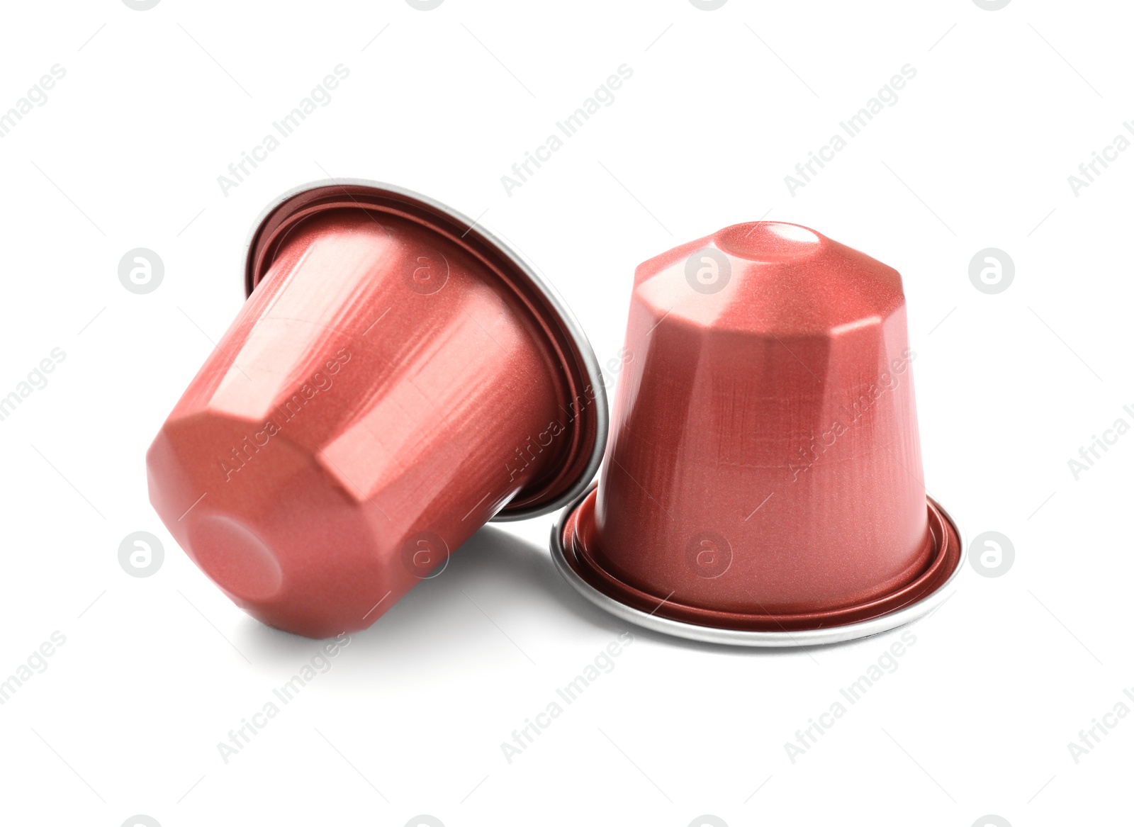 Photo of Two plastic coffee capsules isolated on white