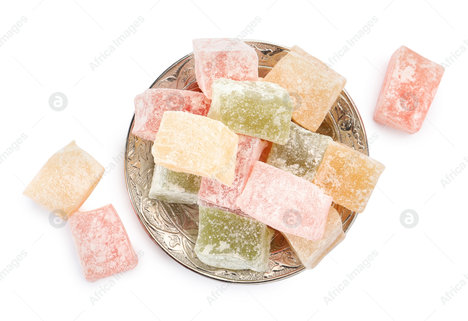 Photo of Turkish delight dessert in plate on white background, top view