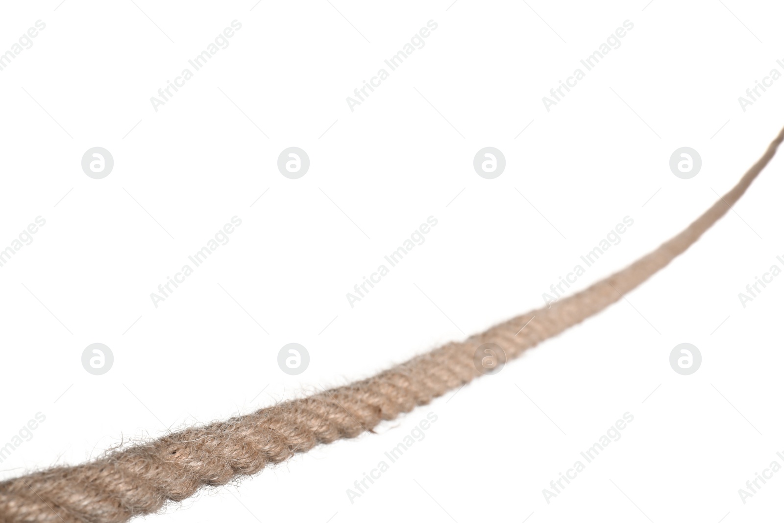 Photo of Strong nautical cotton rope on white background