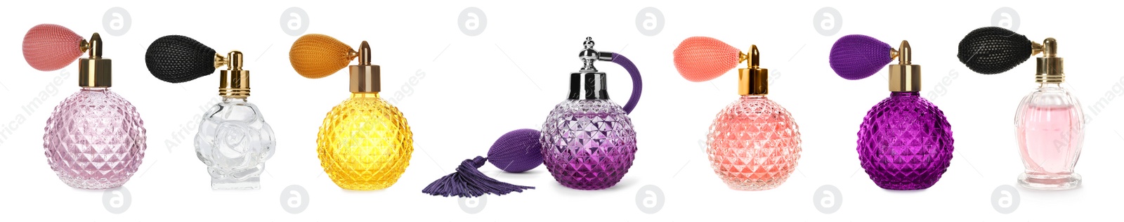 Image of Set with different bottles of perfume on white background, banner design 