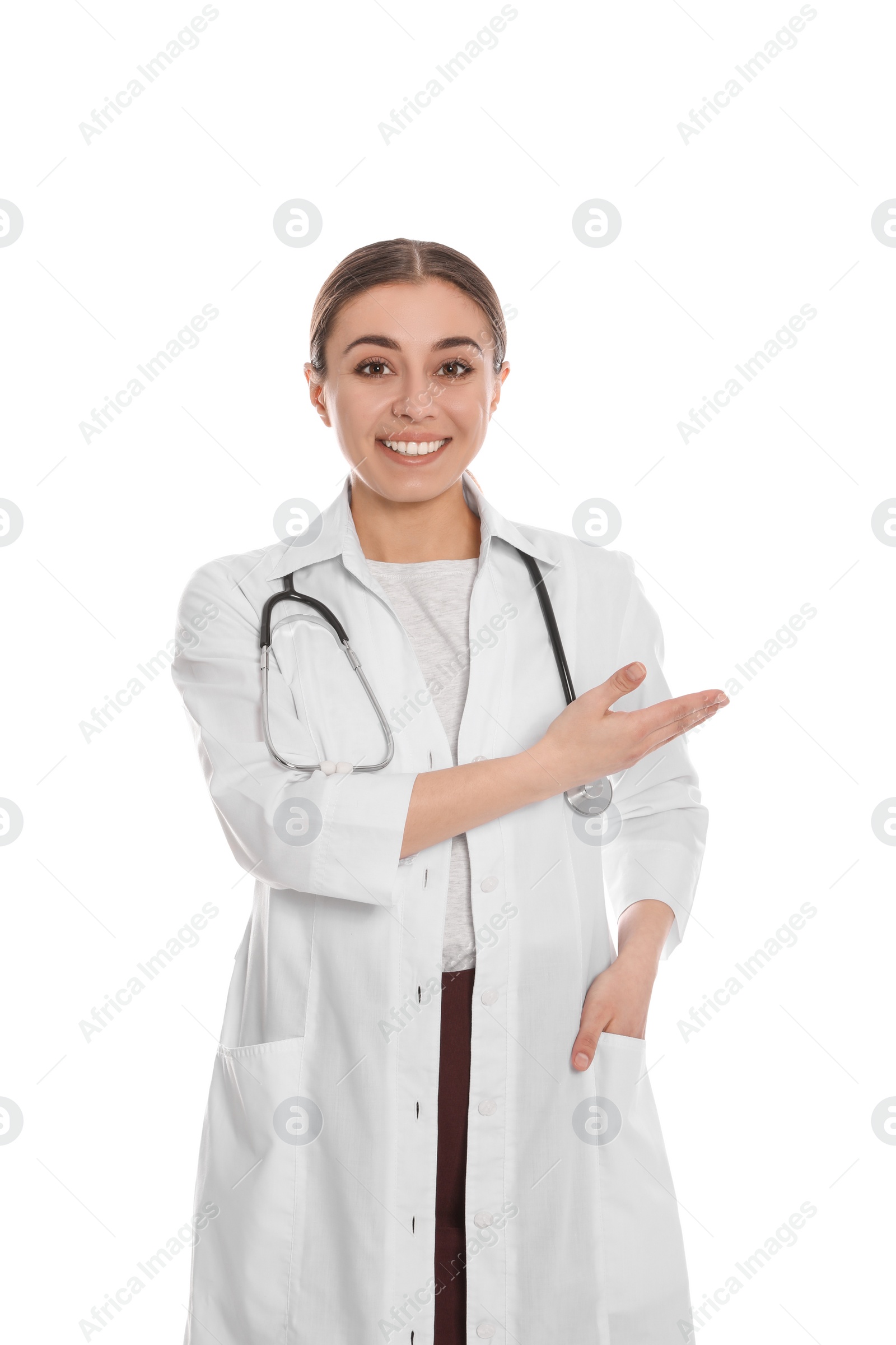 Photo of Portrait of medical doctor with stethoscope isolated on white