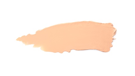 Sample of liquid foundation foundation on white background, top view