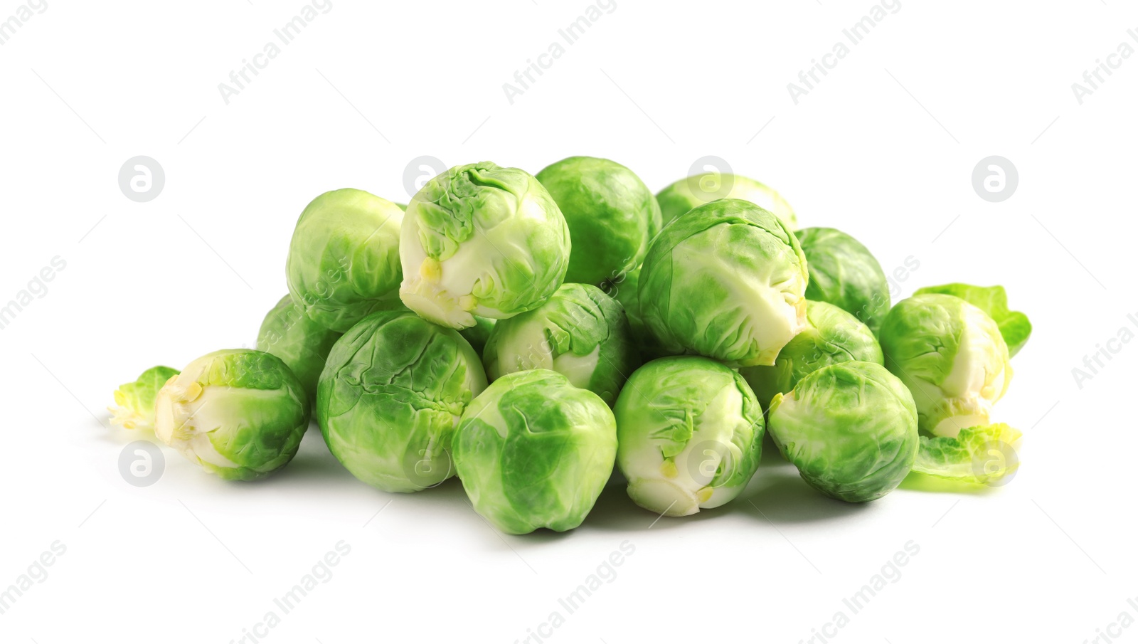 Photo of Pile of fresh Brussels sprouts on white background