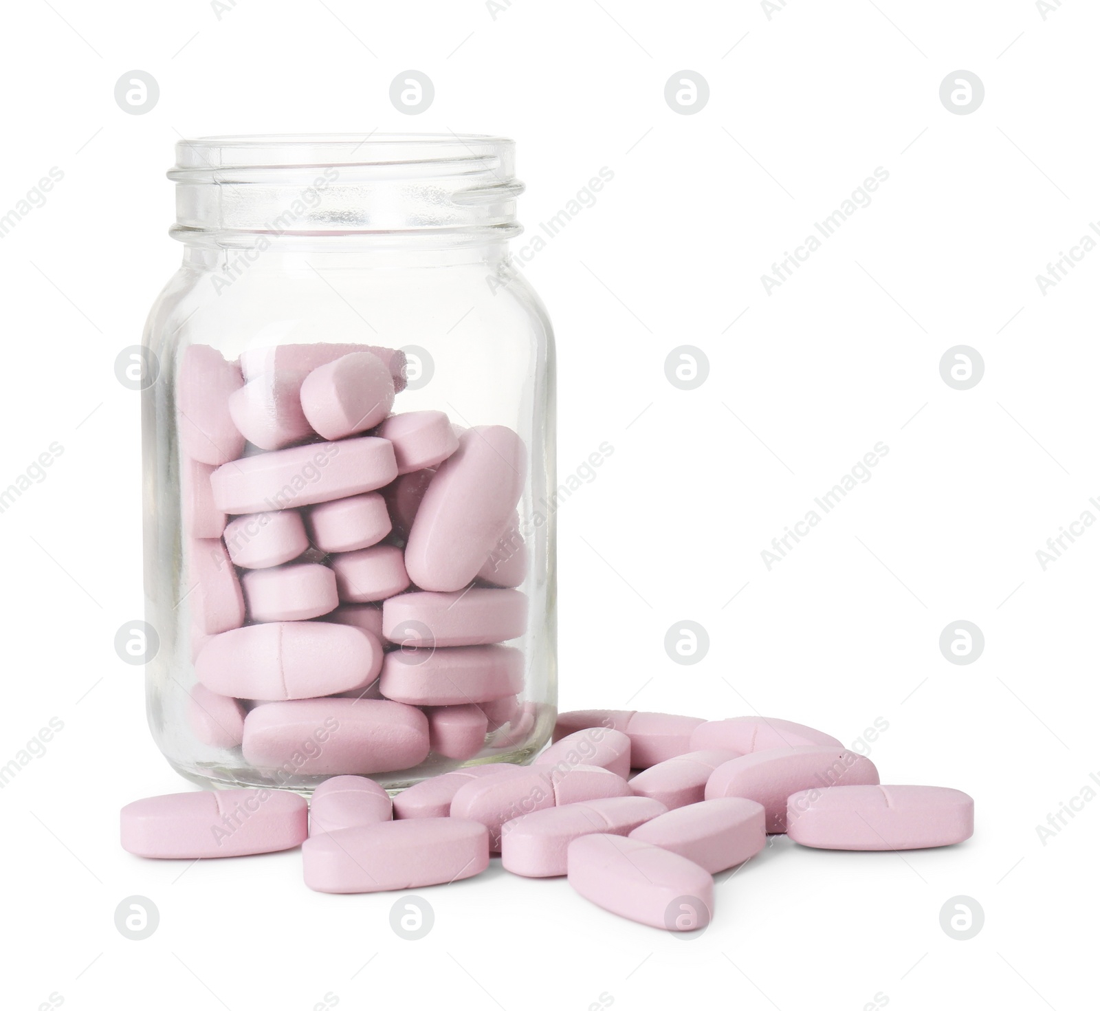 Photo of Bottle and pile of vitamin pills isolated on white