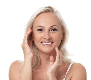 Photo of Portrait of beautiful mature woman with perfect skin on white background