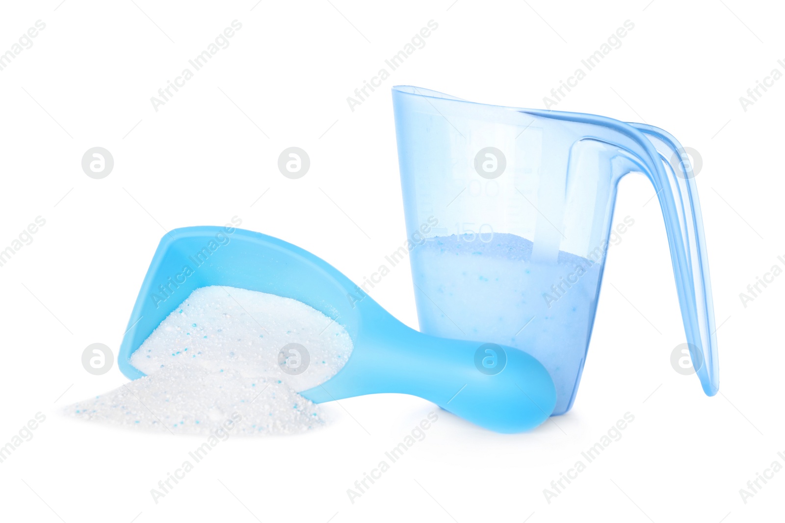 Photo of Laundry detergent in plastic measuring containers on white background