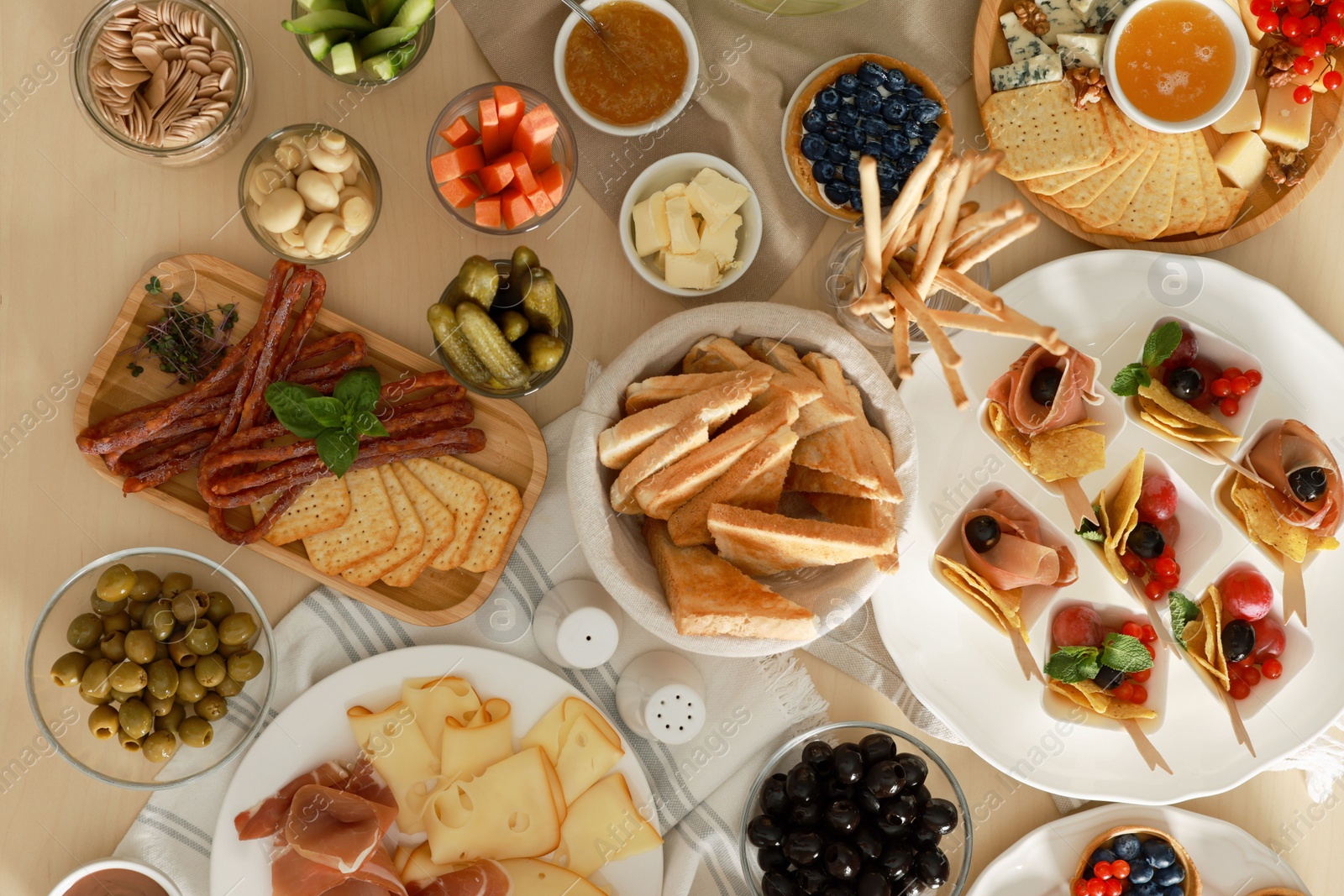 Photo of Dishes with different food on table, flat lay. Luxury brunch