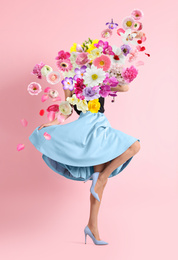 Image of Creative spring fashion composition. Dancing girl and flowers splash