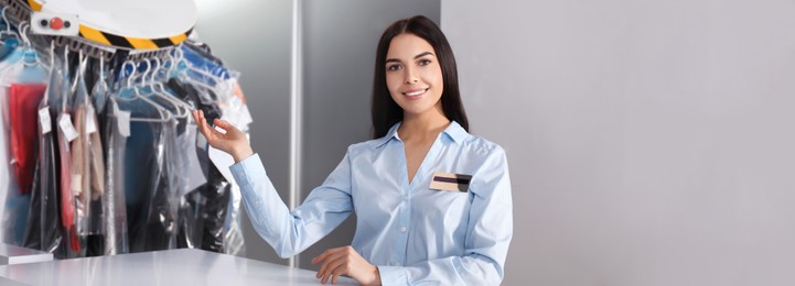 Female worker near counter, banner design. Dry-cleaning service