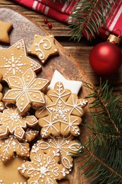 Flat lay composition with tasty Christmas cookies on wooden table