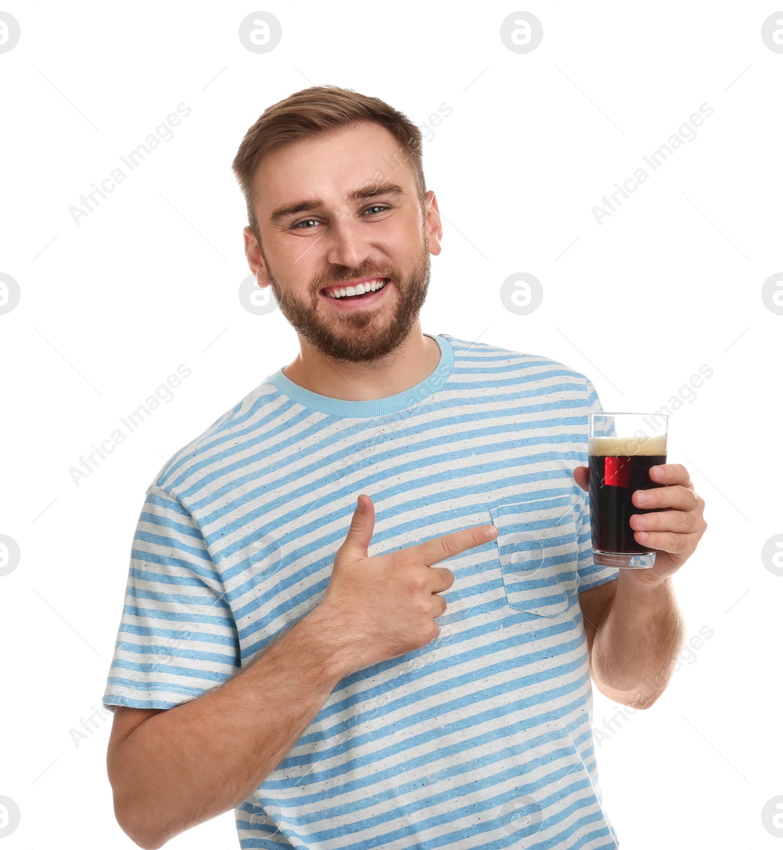 Photo of Handsome man with cold kvass on white background. Traditional Russian summer drink