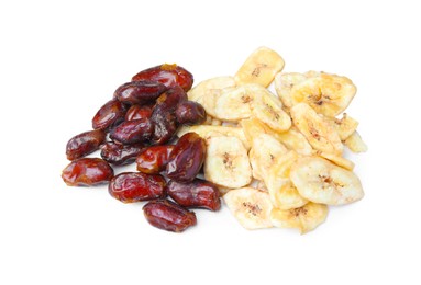 Tasty dried bananas and dates on white background