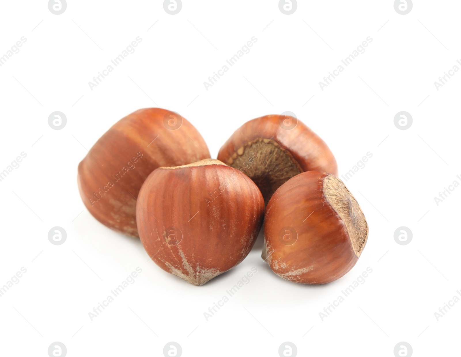 Photo of Tasty organic hazelnuts on white background. Healthy snack