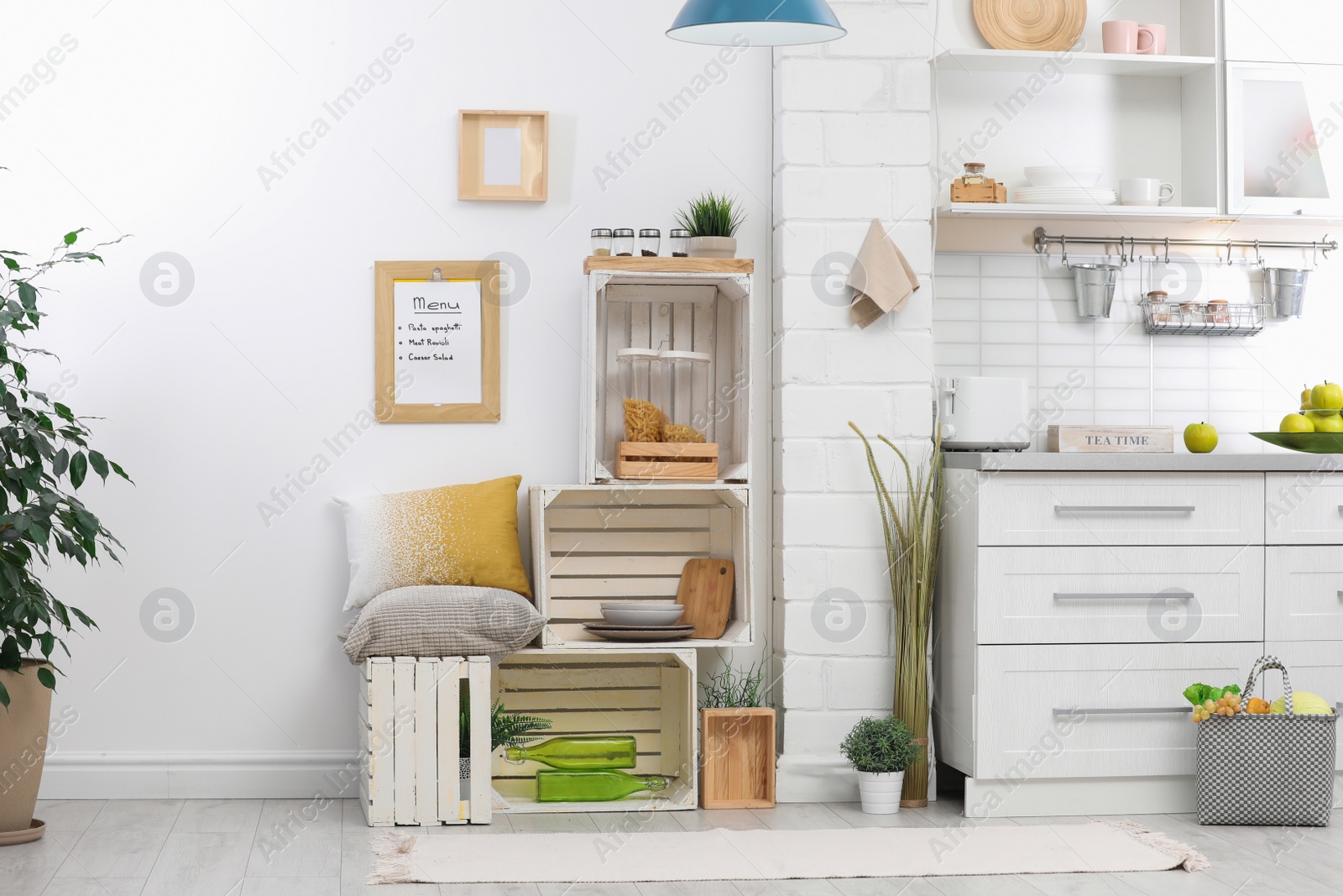 Photo of Modern kitchen interior with wooden crates as eco furniture