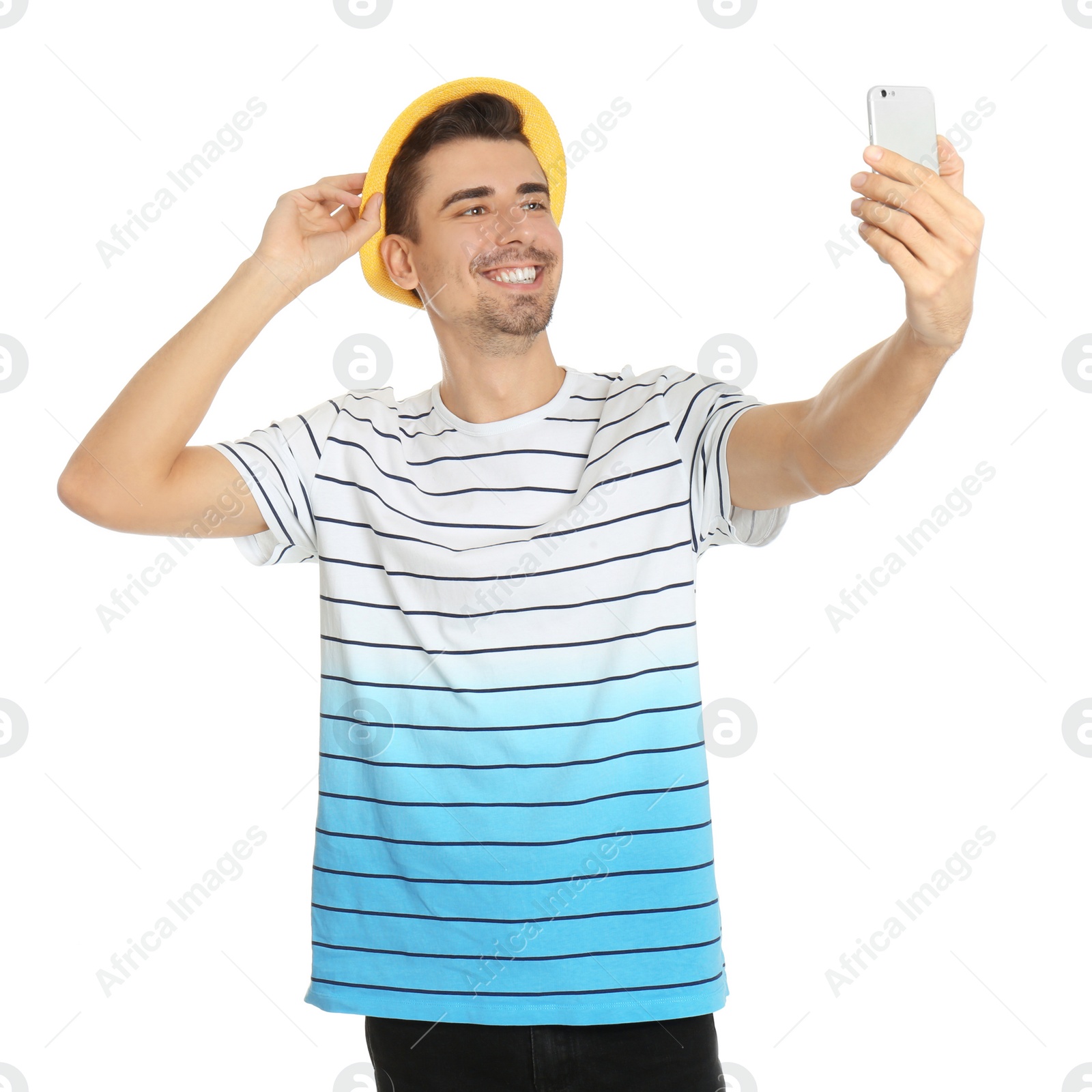 Photo of Young handsome man taking selfie against white background