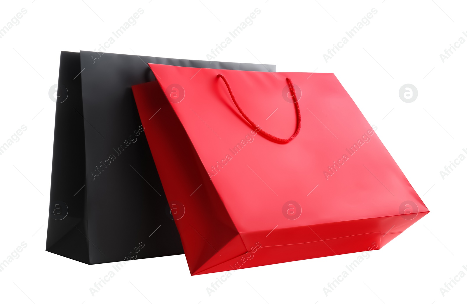 Photo of Different paper shopping bags isolated on white