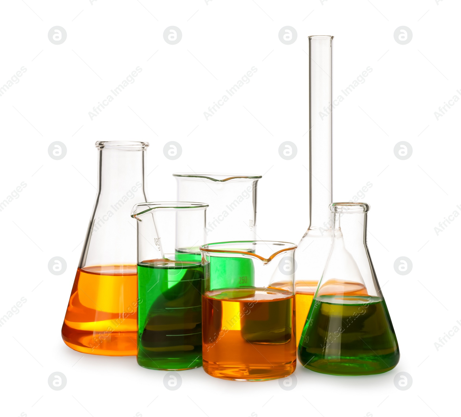 Photo of Laboratory glassware with colorful liquids on white background