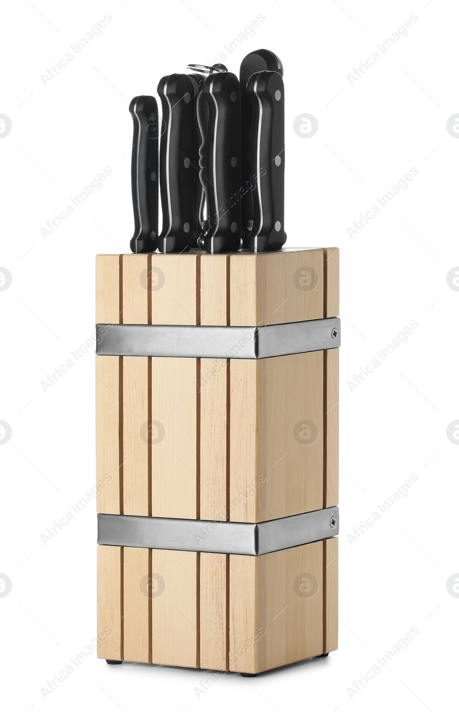 Photo of Wooden holder with different knives isolated on white