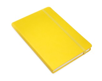 Photo of Closed yellow office notebook isolated on white