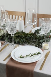 Stylish elegant table setting for festive dinner indoors