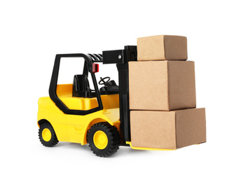 Toy forklift with boxes isolated on white. Logistics and wholesale concept