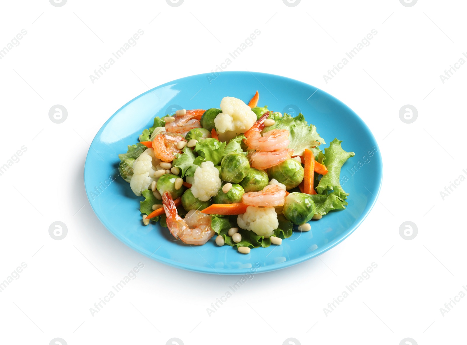 Photo of Plate of salad with Brussels sprouts isolated on white