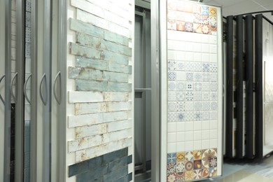 Assortment of tiles in store. Many different samples indoors