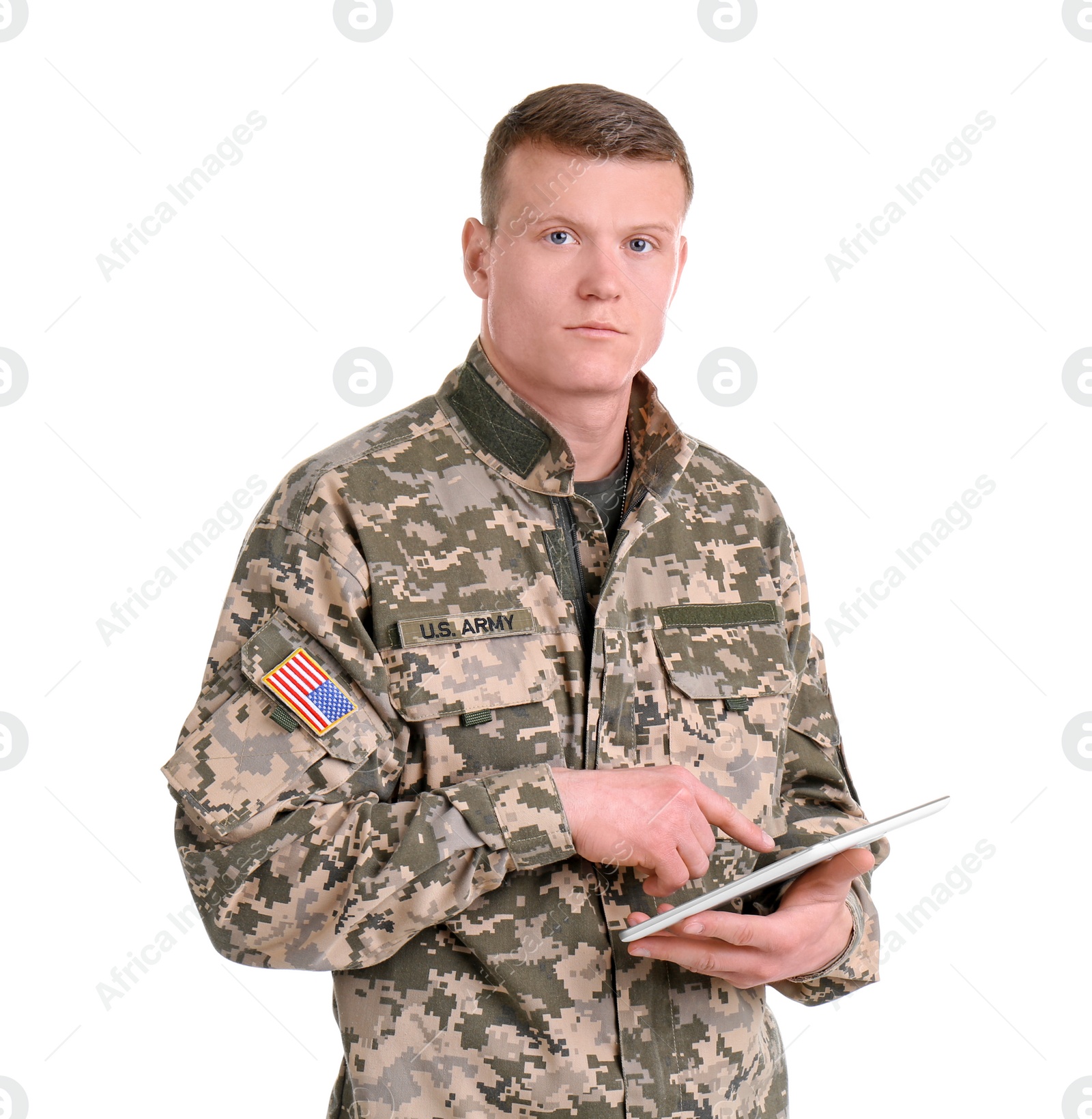 Photo of Male soldier using tablet computer on white background. Military service