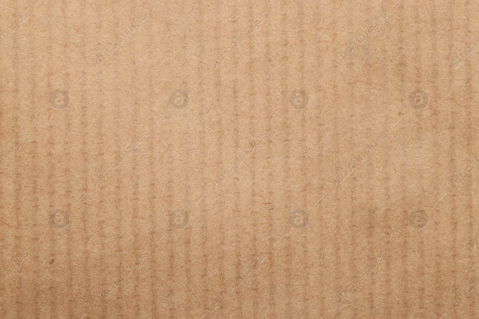 Photo of Texture of beige paper sheet as background, top view