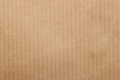 Texture of beige paper sheet as background, top view