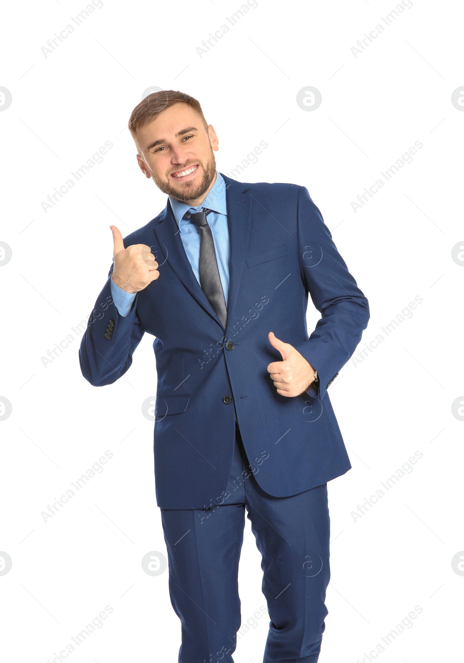 Photo of Young businessman celebrating victory on white background