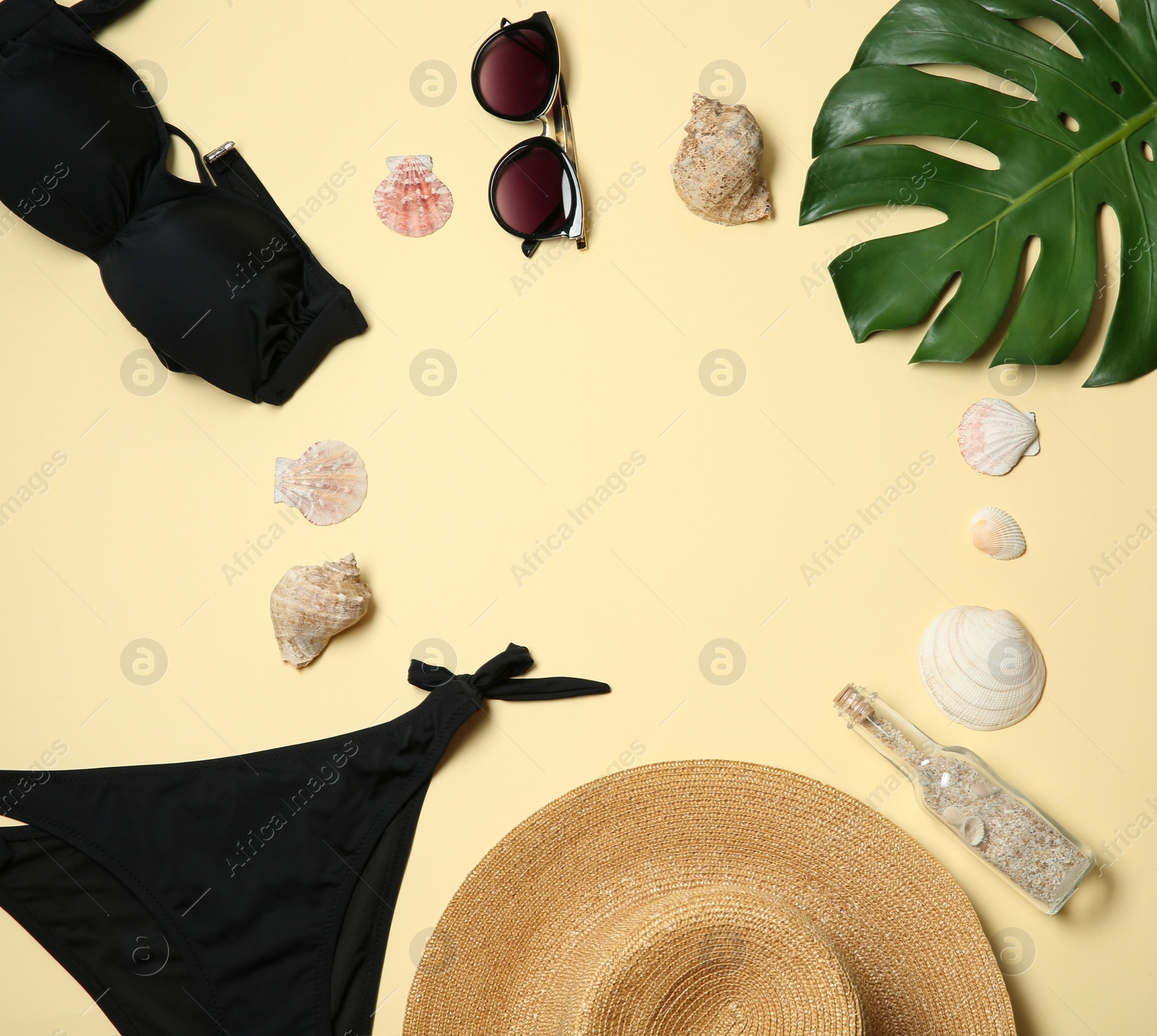 Photo of Flat lay composition with stylish bikini on color background. Space for text