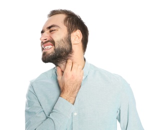 Photo of Young man scratching beard on white background. Annoying itch