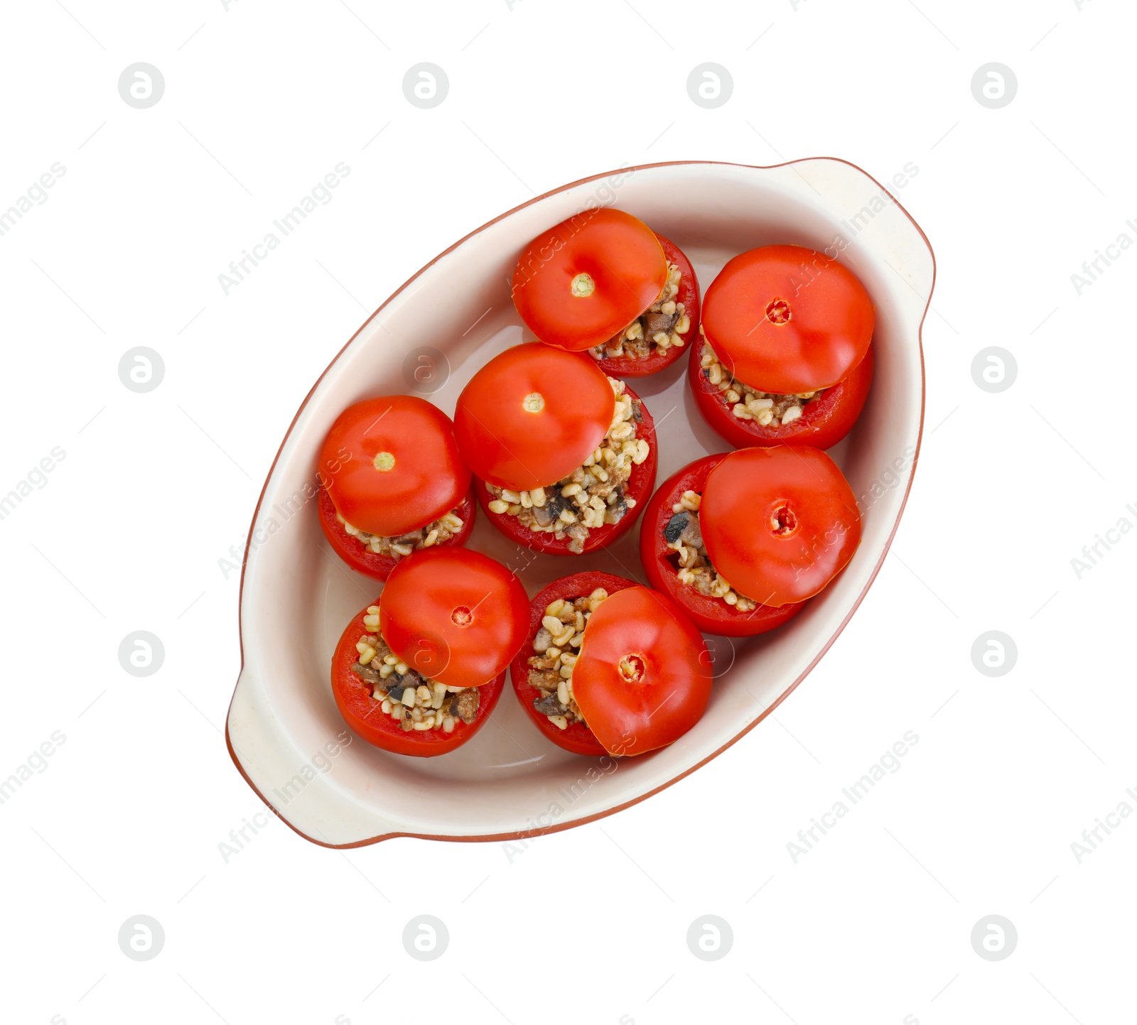 Photo of Delicious stuffed tomatoes with minced beef, bulgur and mushrooms in baking dish isolated on white, top view