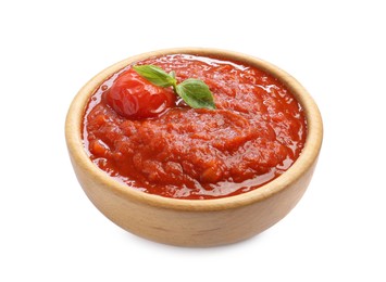 Photo of Homemade tomato sauce and basil in bowl isolated on white