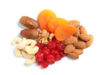 Photo of Different dried fruits and nuts on white background