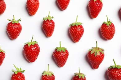 Photo of Flat lay composition with strawberries on light background