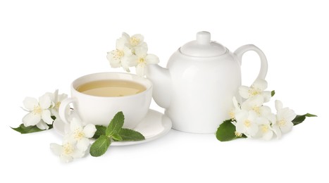 Photo of Aromatic herbal tea with mint and jasmine flowers isolated on white