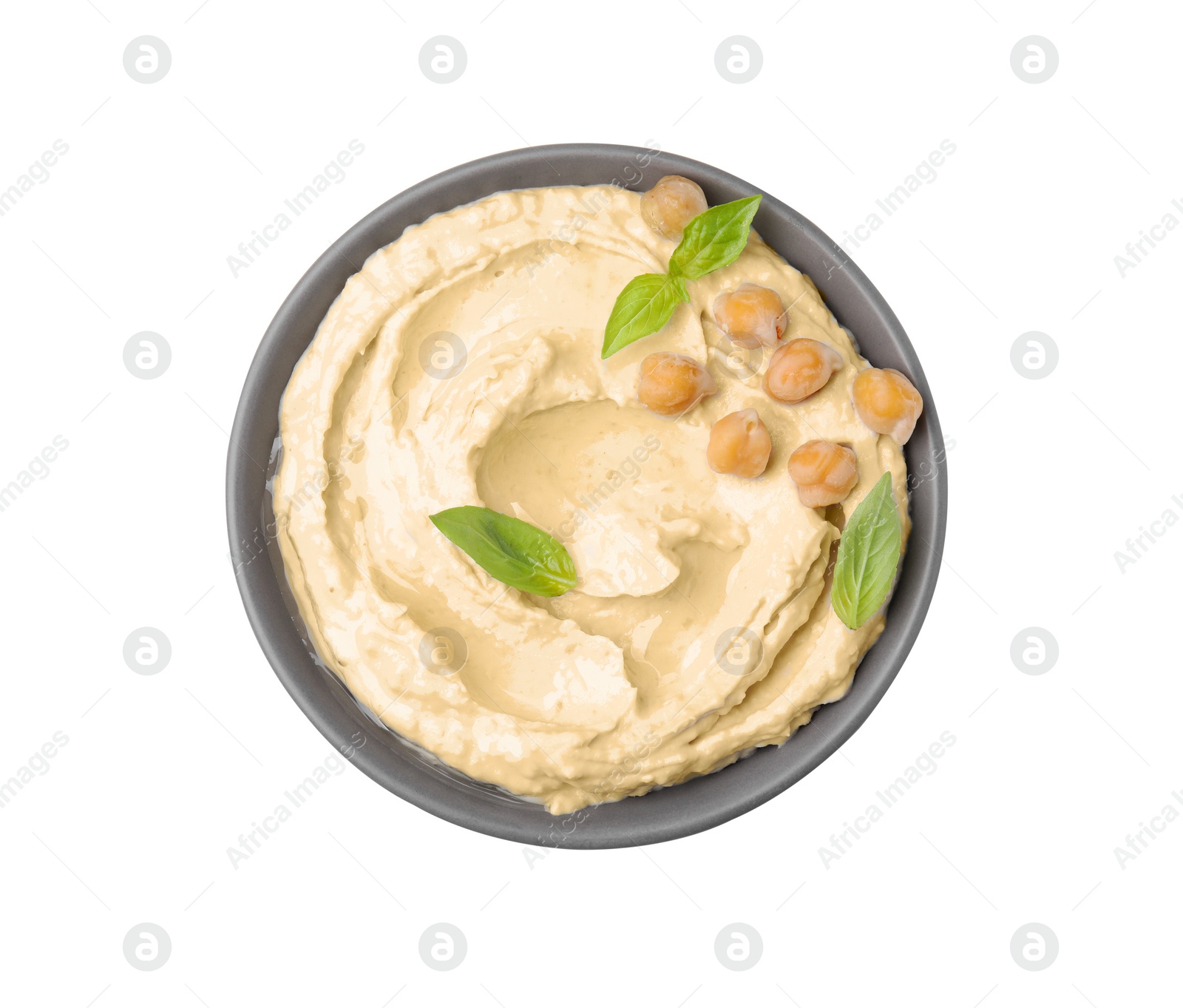 Photo of Bowl of delicious hummus with chickpeas isolated on white, top view