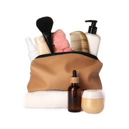 Photo of Preparation for spa. Compact toiletry bag and different cosmetic products isolated on white