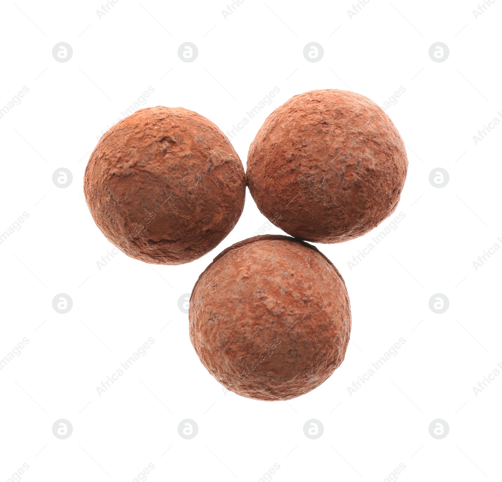 Photo of Delicious chocolate candies on white background, top view