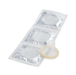 Unpacked condom and packages on white background. Safe sex