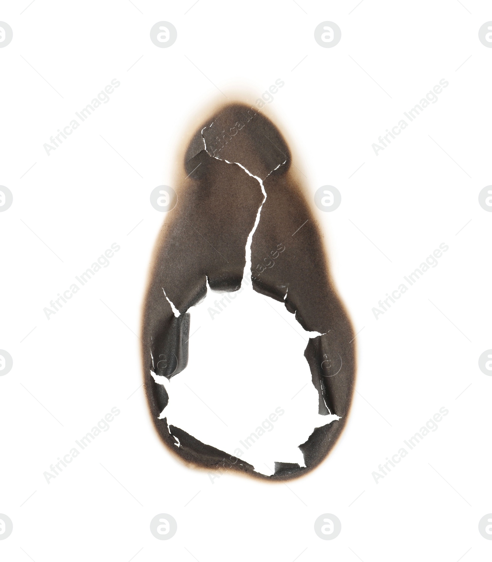 Photo of Burnt hole in paper on white background