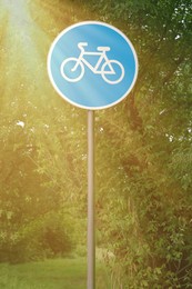 Traffic sign Bicycles Only near plants in park