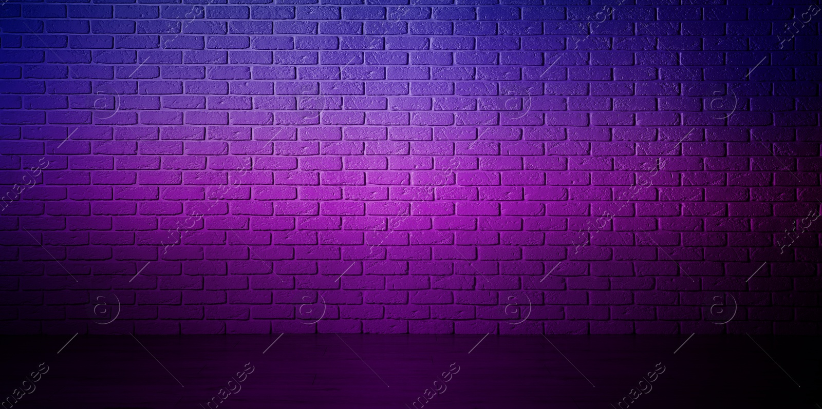 Image of Room with brick wall and wooden floor in neon lights, banner design