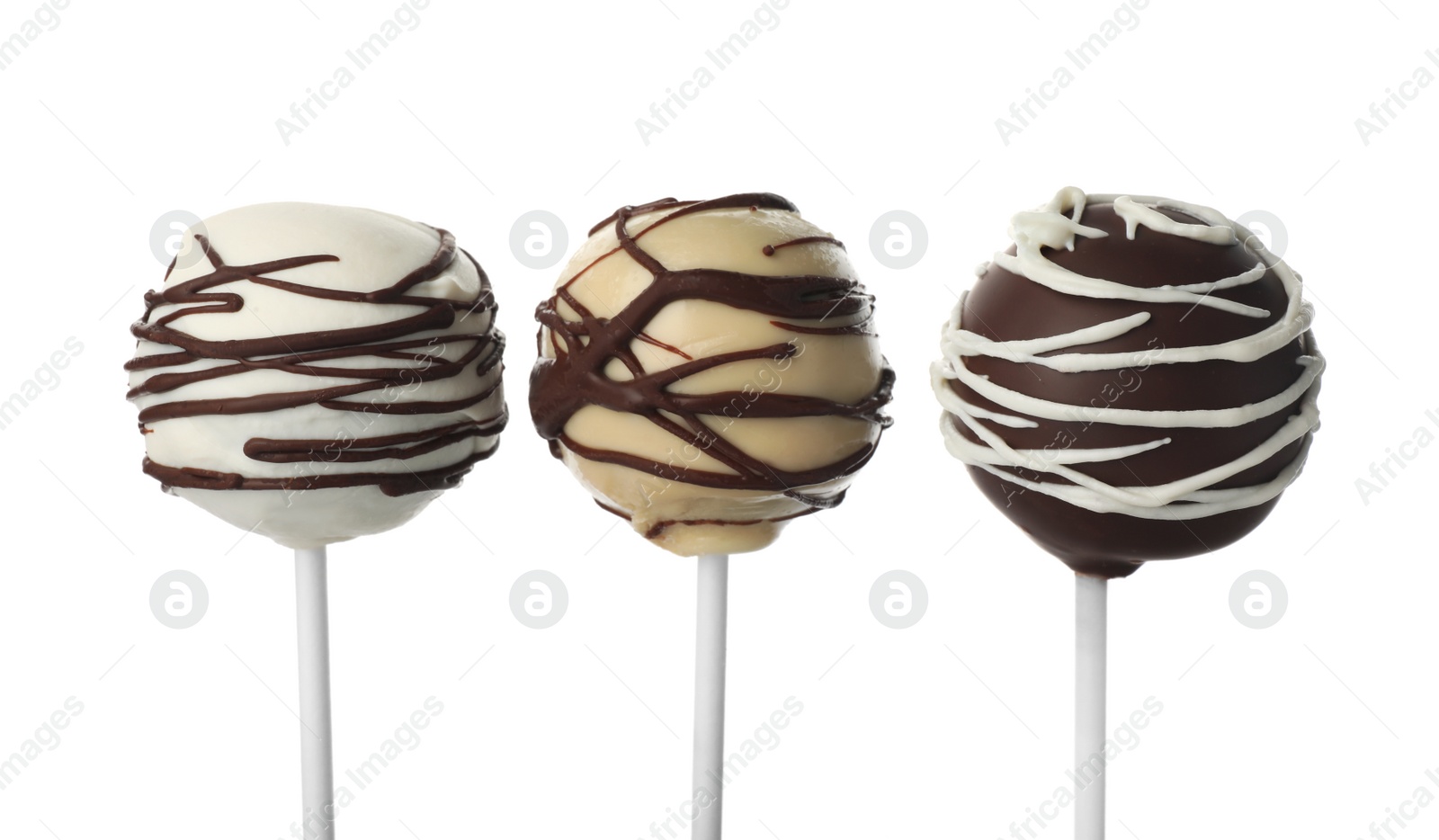 Photo of Tasty cake pops decorated with chocolate isolated on white